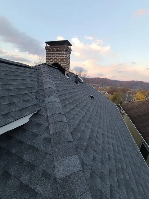 Slide of One Day Roofing