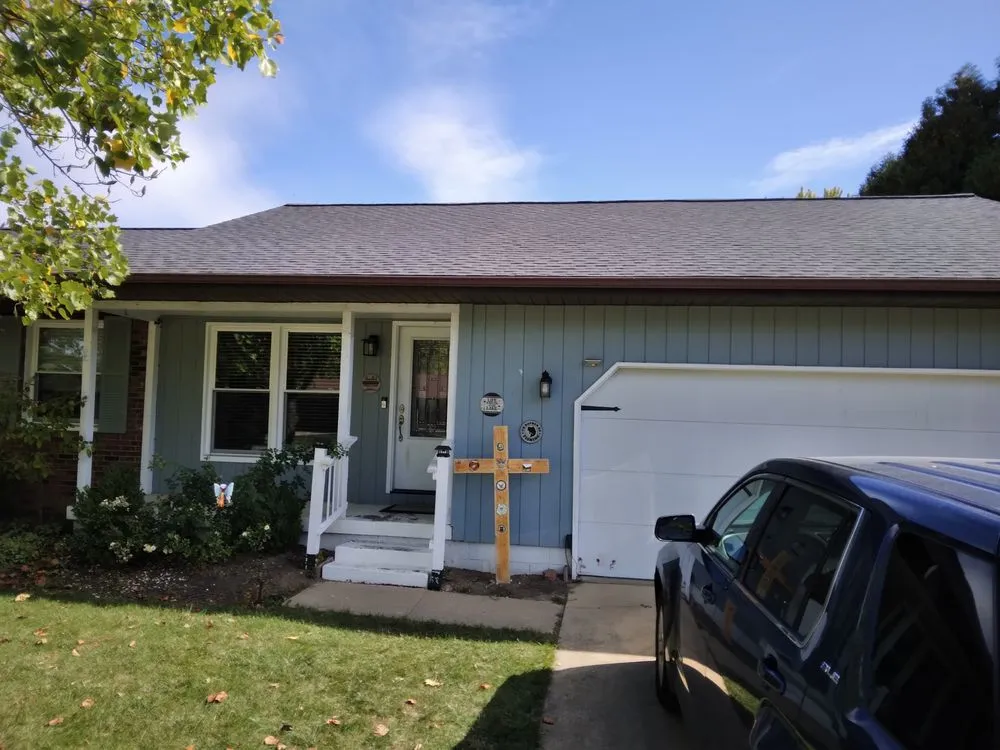 Slide of One Day Roofing