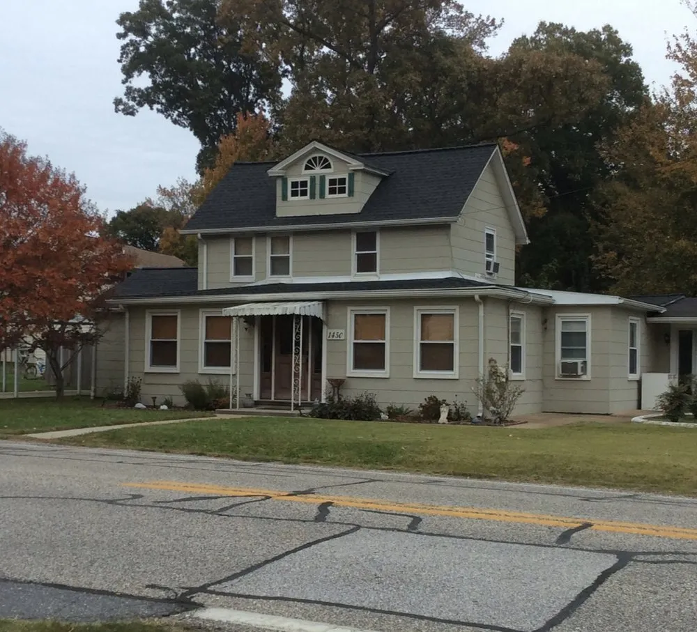 Slide of One Day Roofing