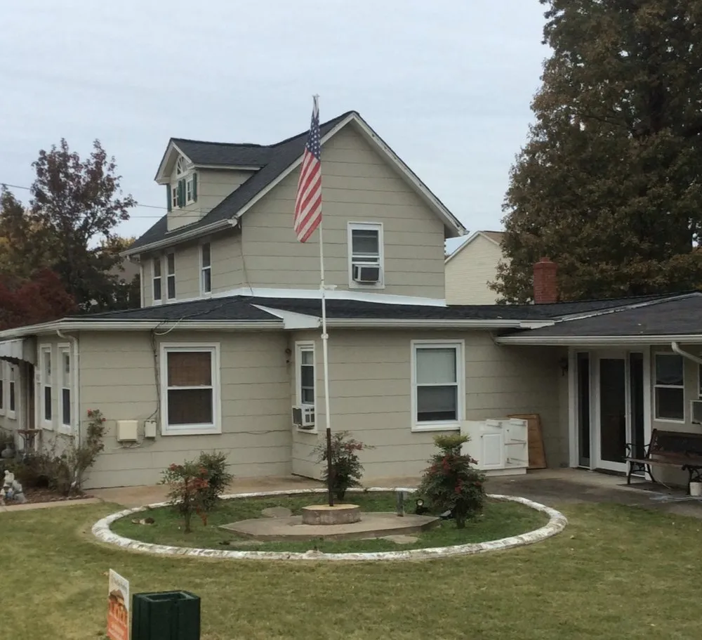 Slide of One Day Roofing