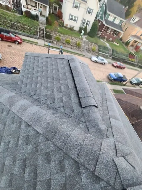 Slide of One Day Roofing