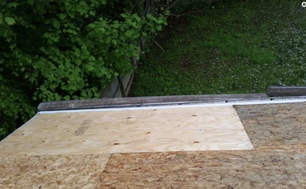 Slide of One Day Roofing