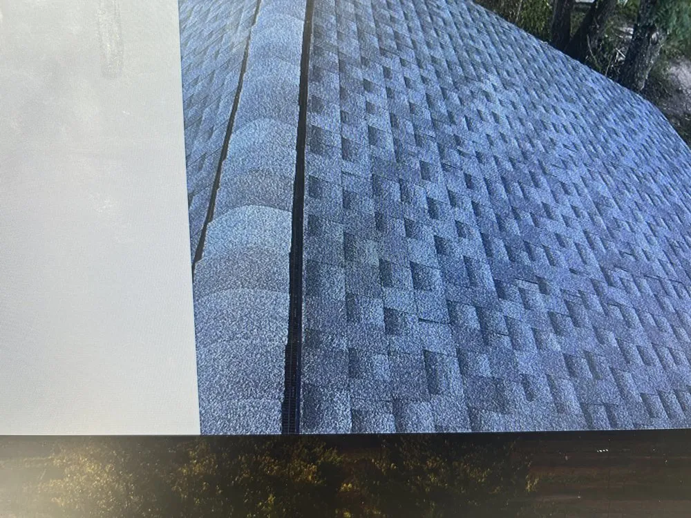 Slide of One Day Roofing