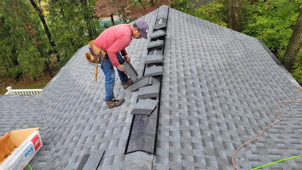 Slide of One Day Roofing