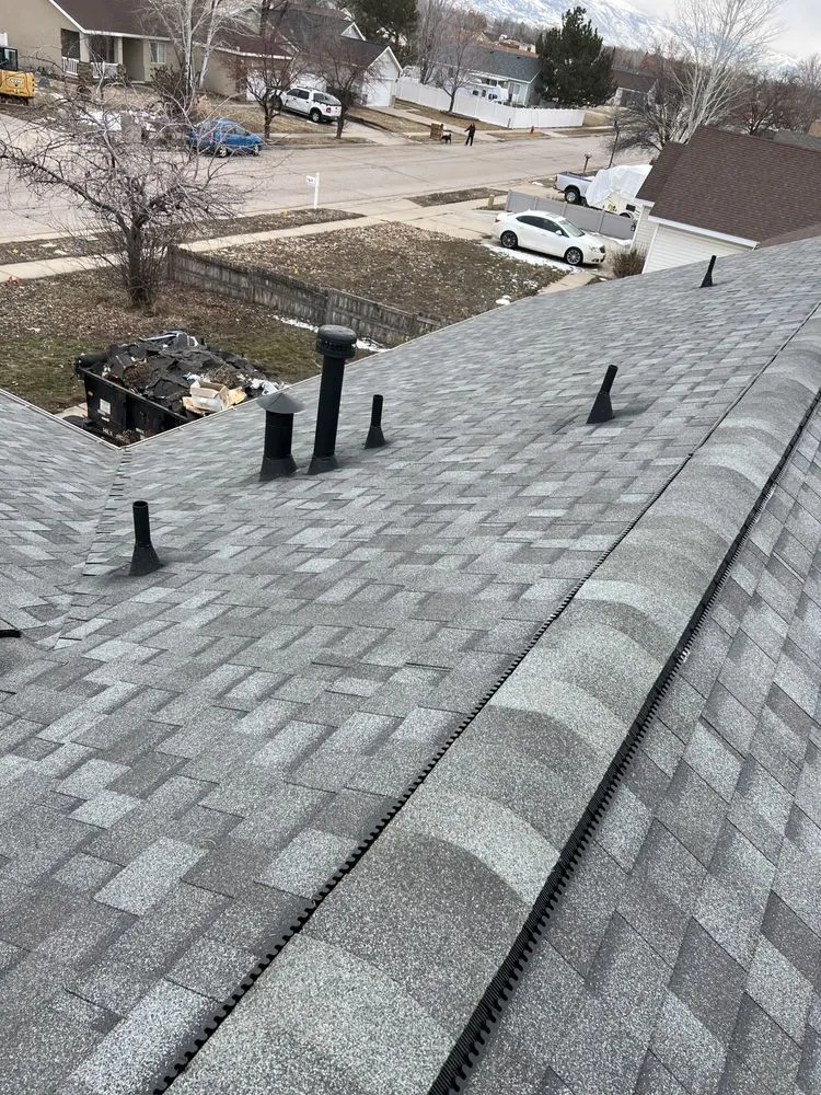 Slide of One Stop Roofing