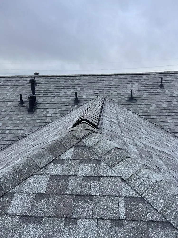 Slide of One Stop Roofing