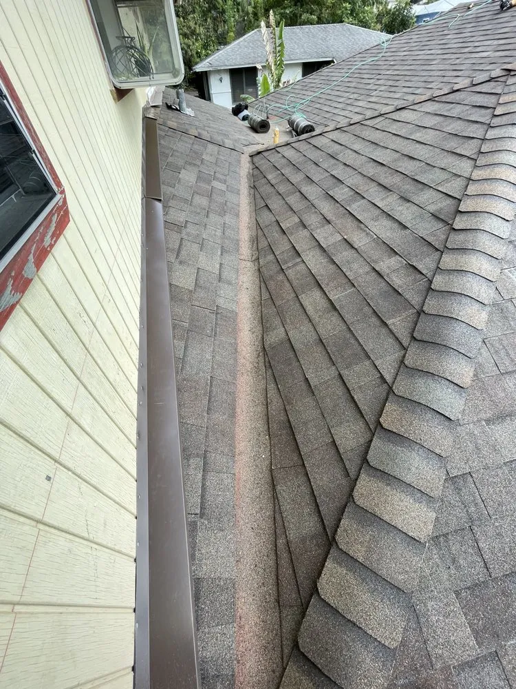 Slide of One Stop Shop Roofing