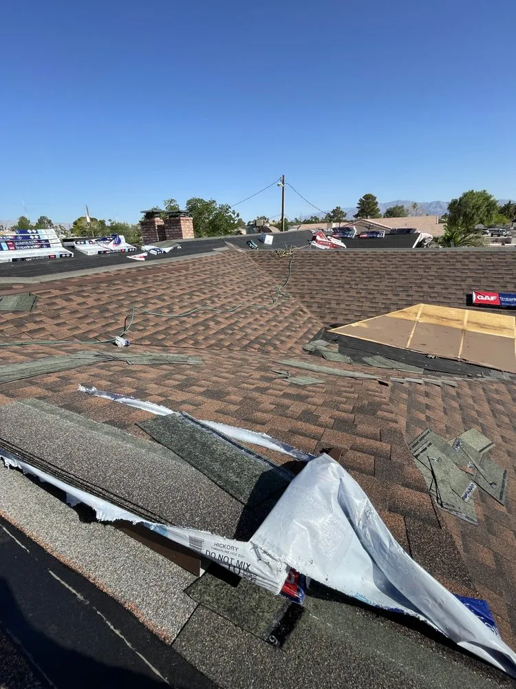 Slide of One Stop Shop Roofing