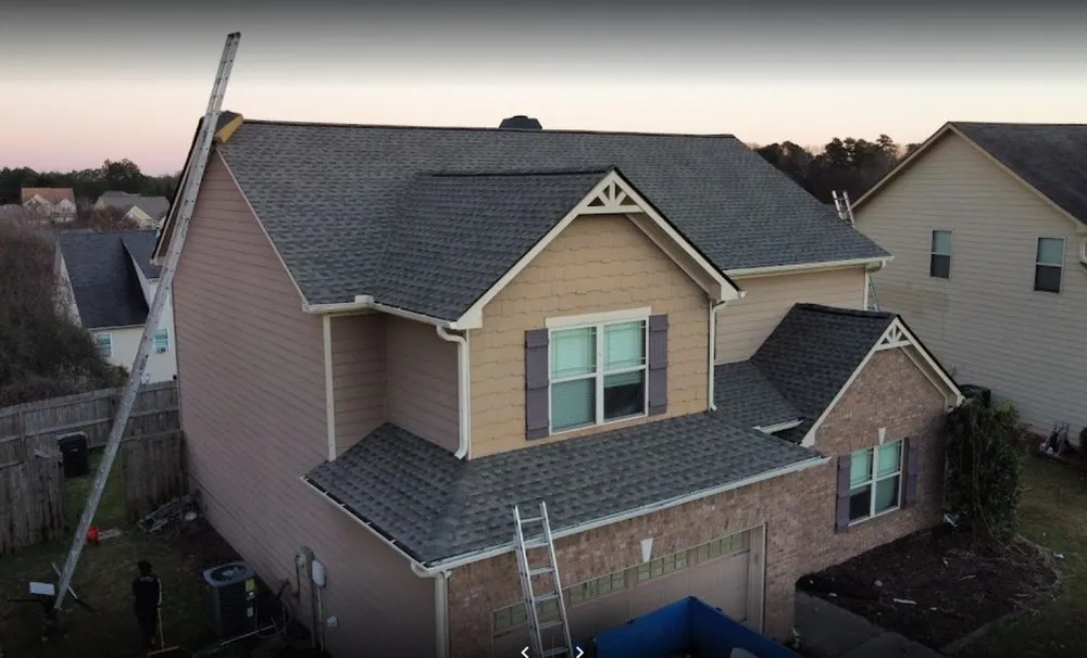Slide of One Tree Roofing