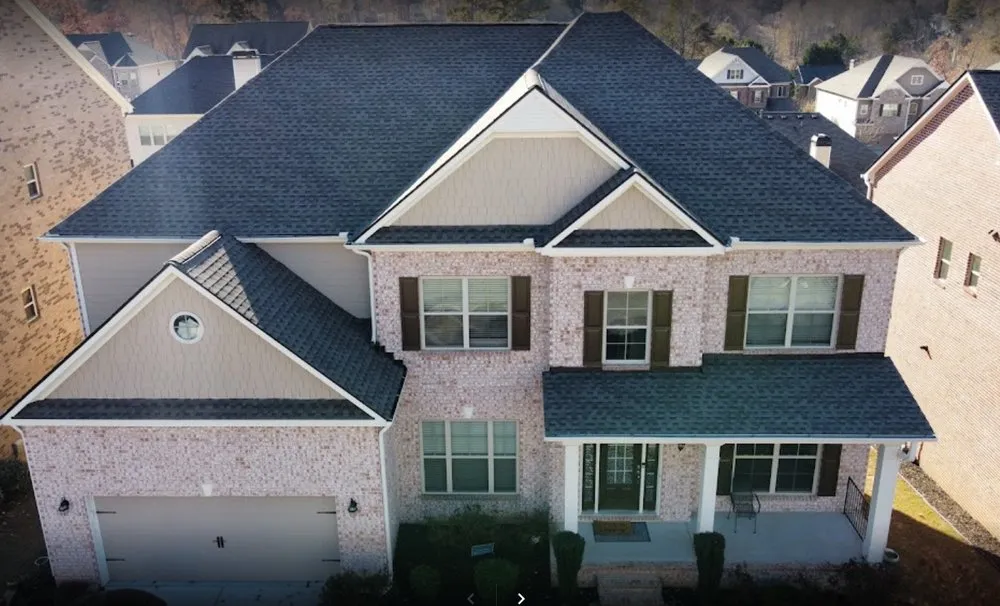 Slide of One Tree Roofing