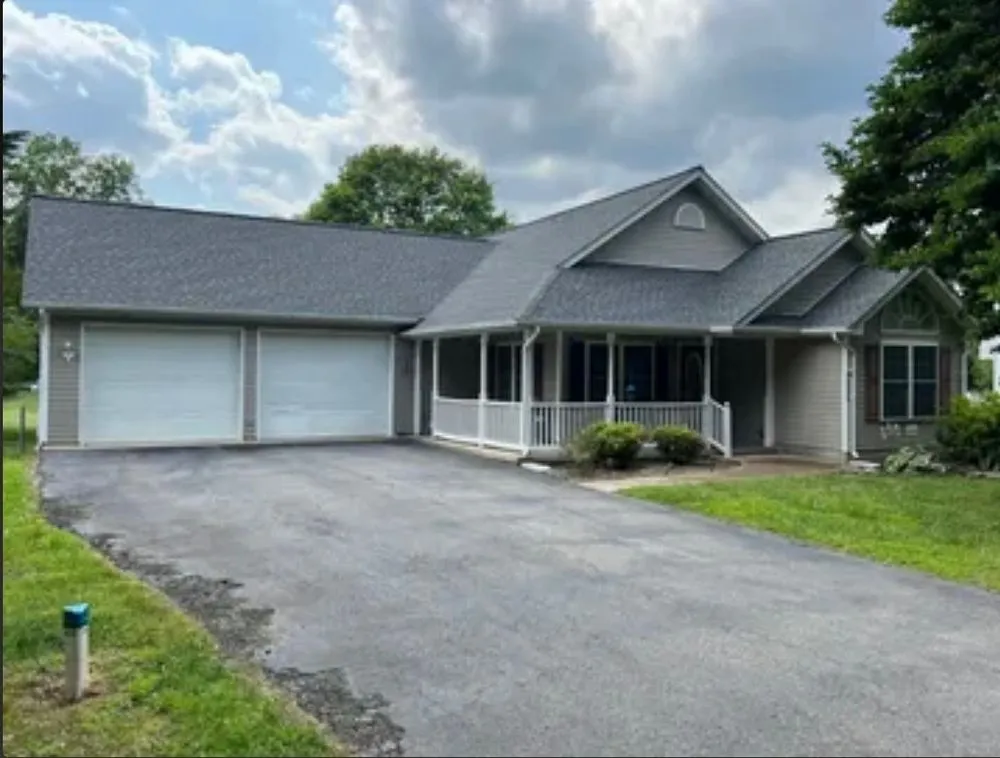 Slide of One Vision Roofing