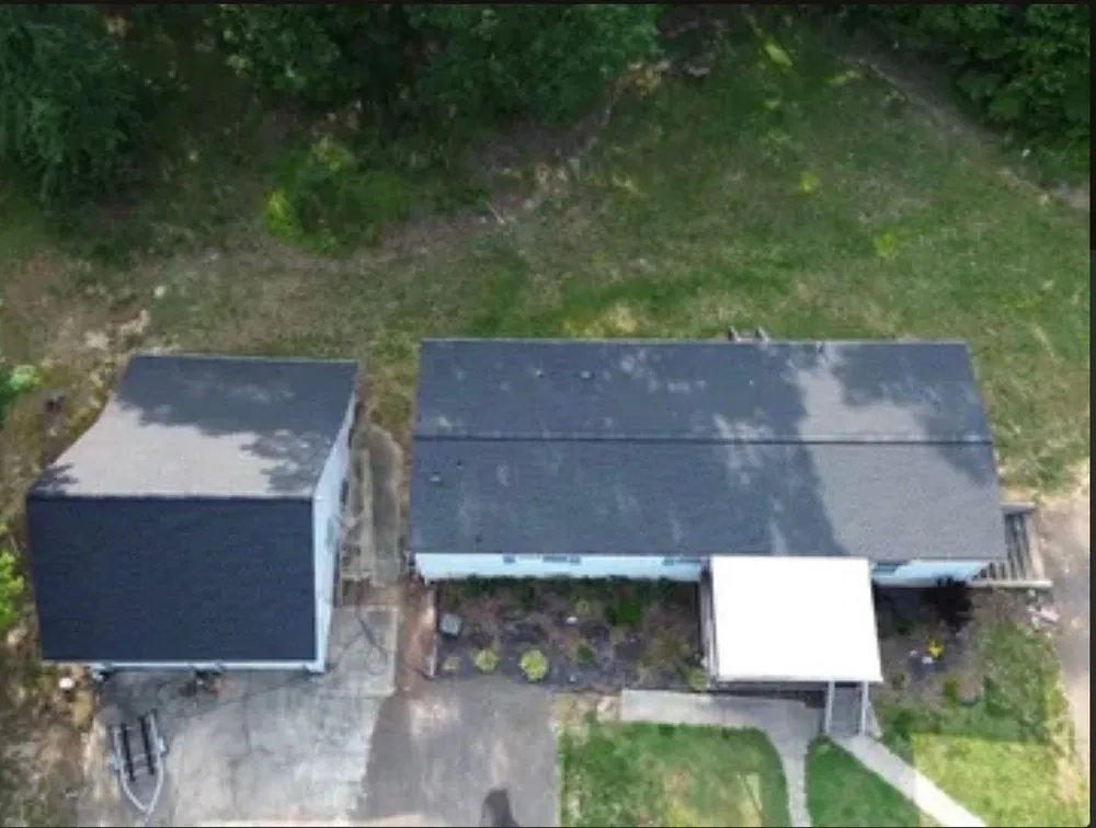 Slide of One Vision Roofing