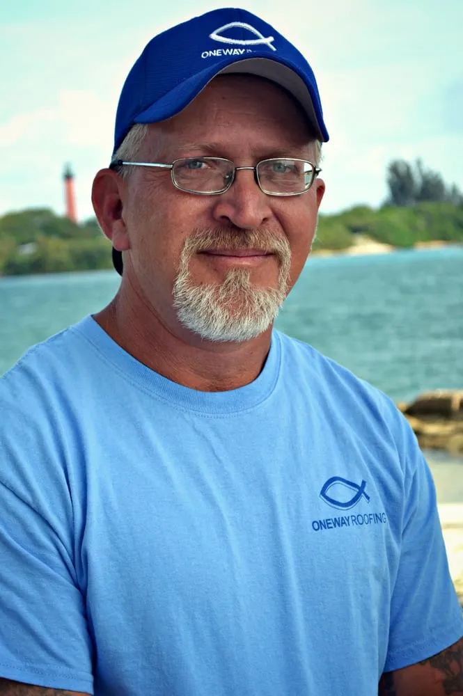 Slide of One Way Roofing