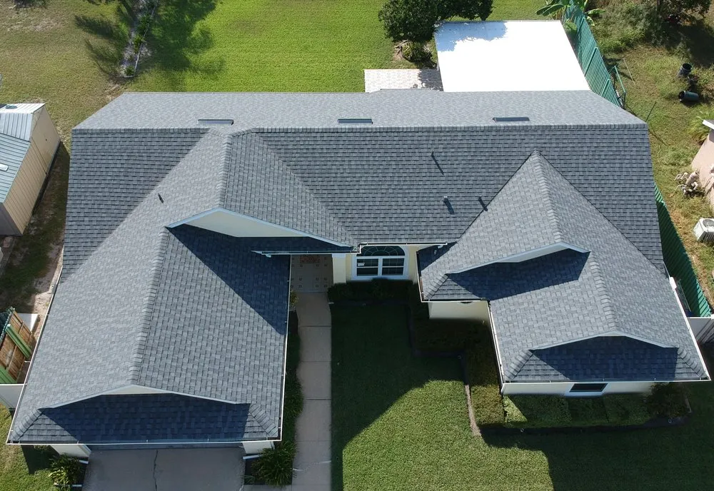 Slide of One World Roofing