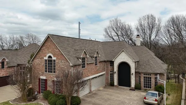 Onyx Storm Roofing Logo