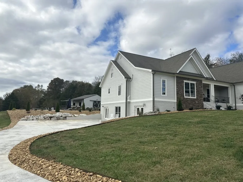 Licensed storm damage roof repair for homes in Ooltewah, TN by Ooltewah Exteriors