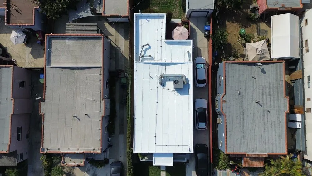 Slide of Optimal Roofing & Solar