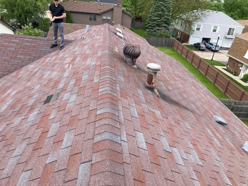 Slide of Optimal Solutions Roofing Construction