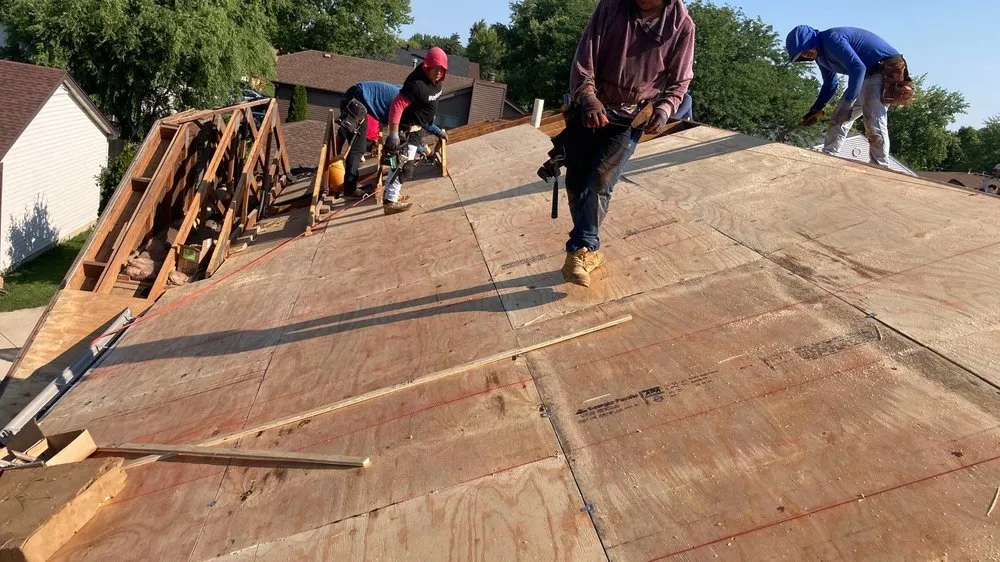 Slide of Optimal Solutions Roofing Construction