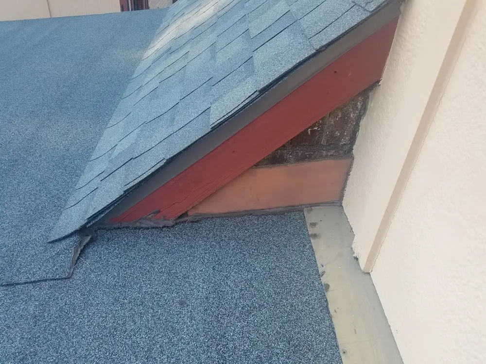 Slide of Orange Elephant Roofing & Construction