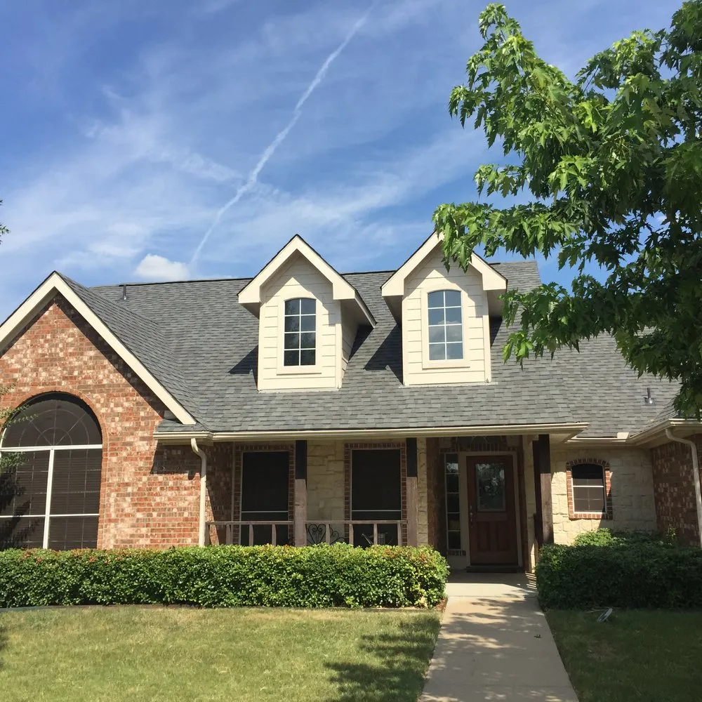 Slide of Orange Elephant Roofing & Construction