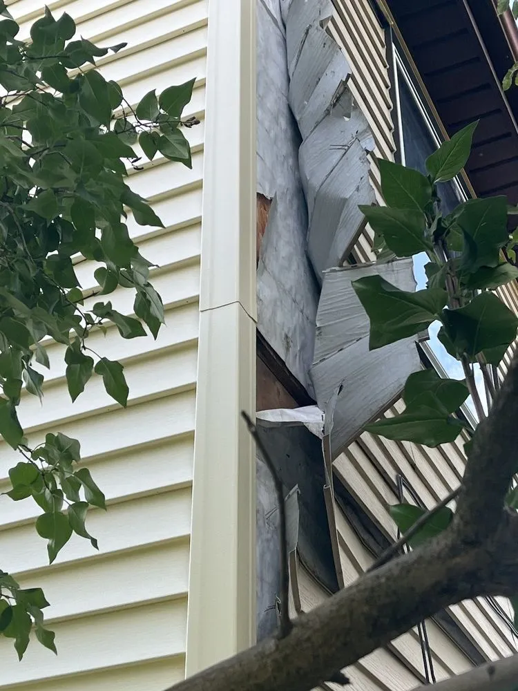 Slide of Orange Elephant Roofing & Solar