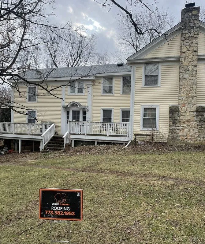 Slide of Orange Elephant Roofing