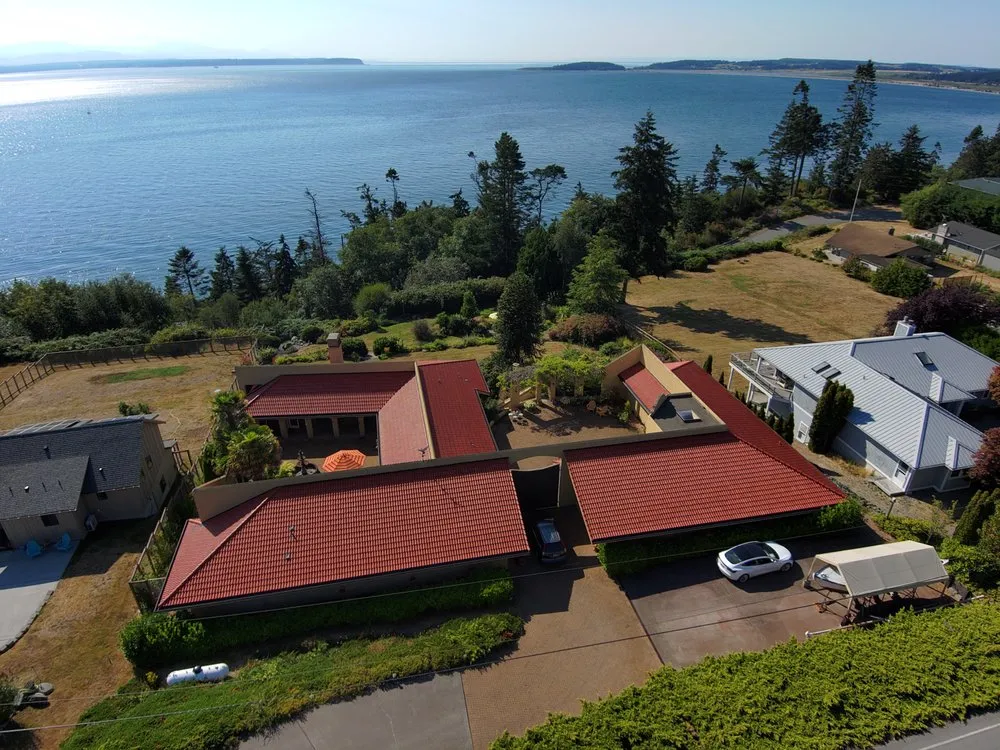 Slide of Orca Roofing & Exteriors