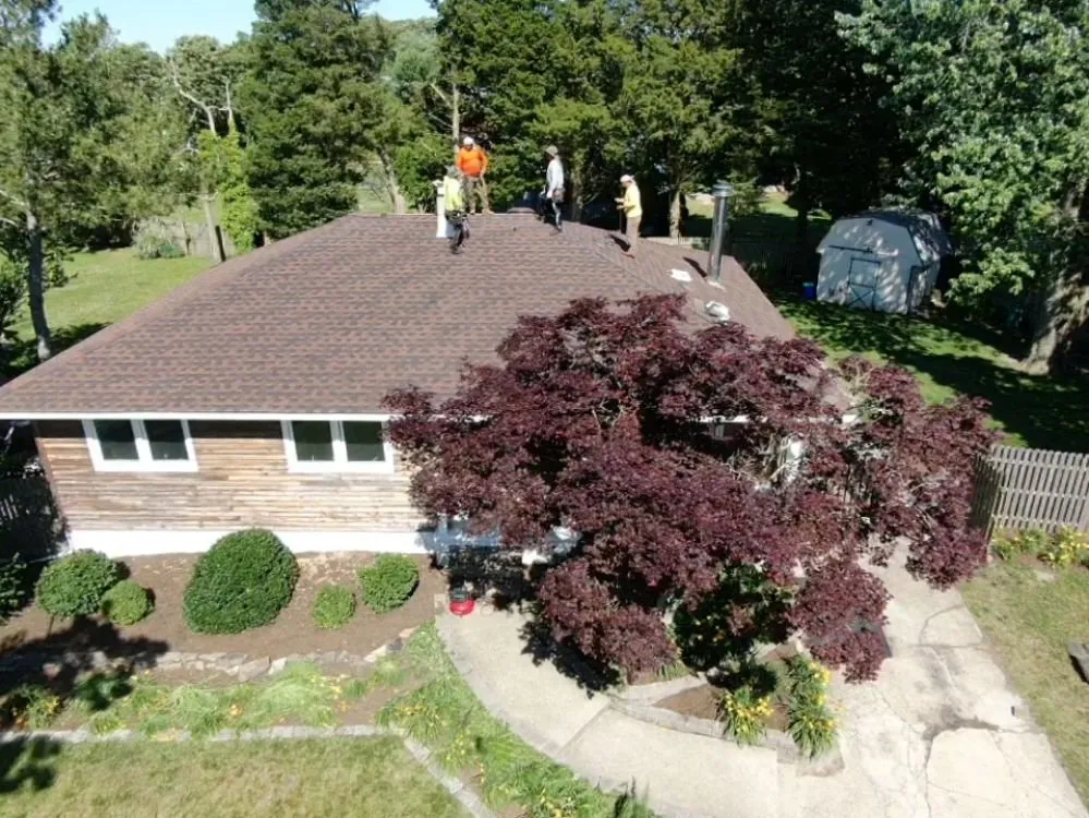Slide of Orellanas Roofing