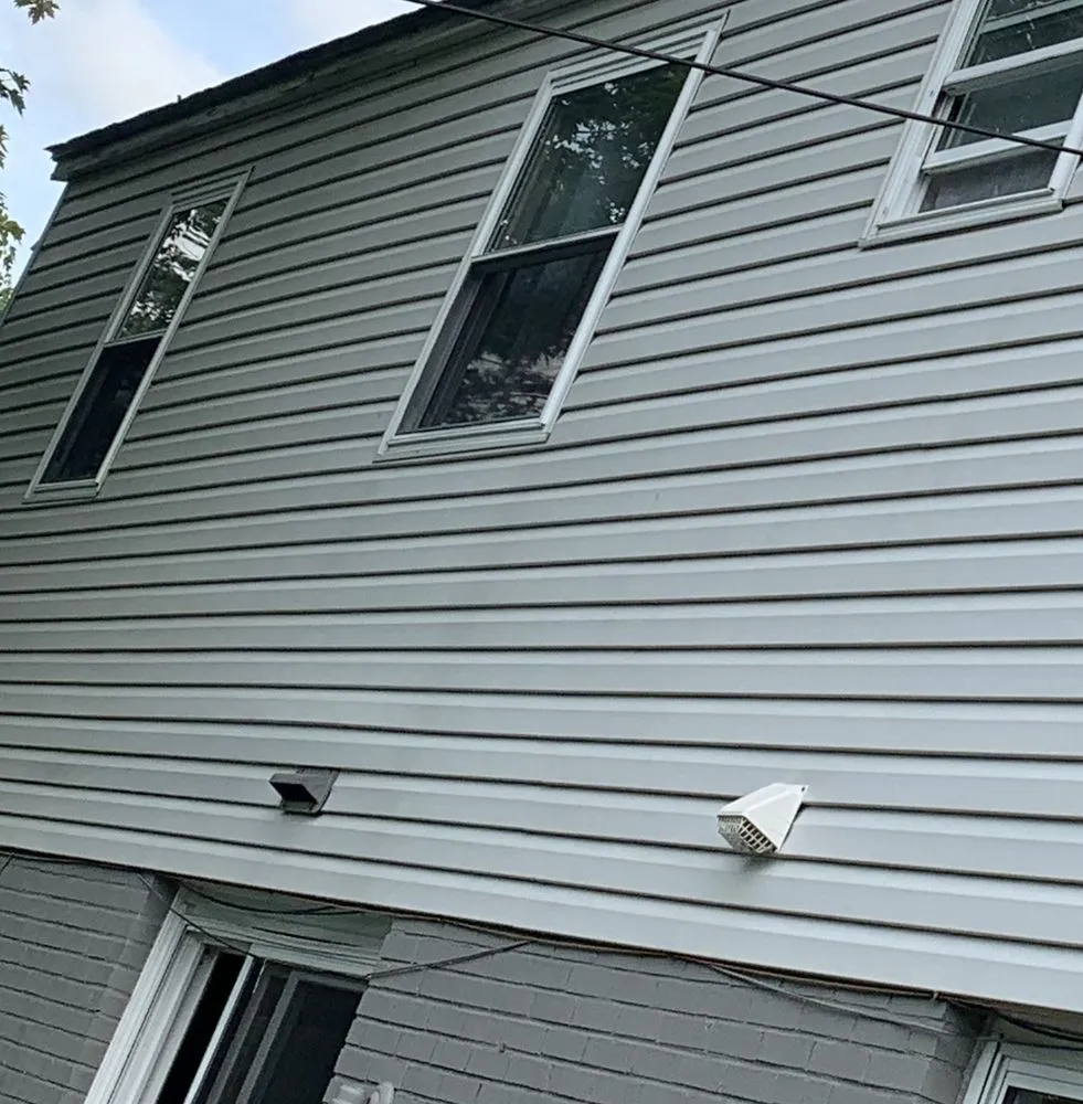 Slide of Origin Roofing and Exteriors