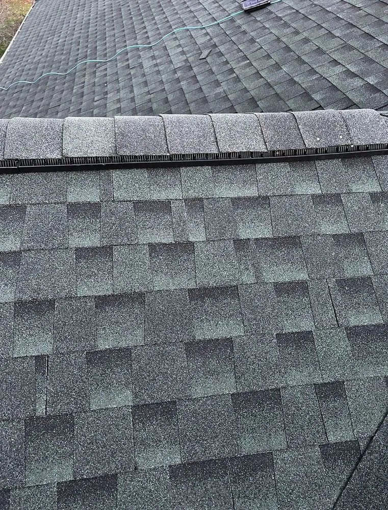 Slide of Origin Roofing and Exteriors