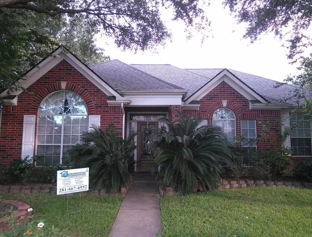 Slide of Orion Roofing & Construction