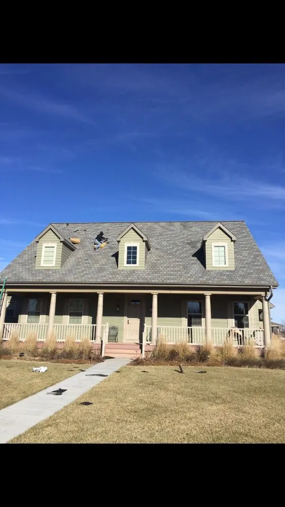 Slide of Oros Roofing & Construction