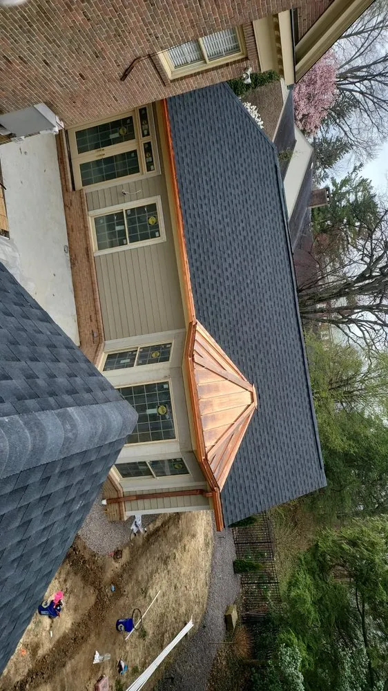 Slide of Ortiz Brothers Roofing