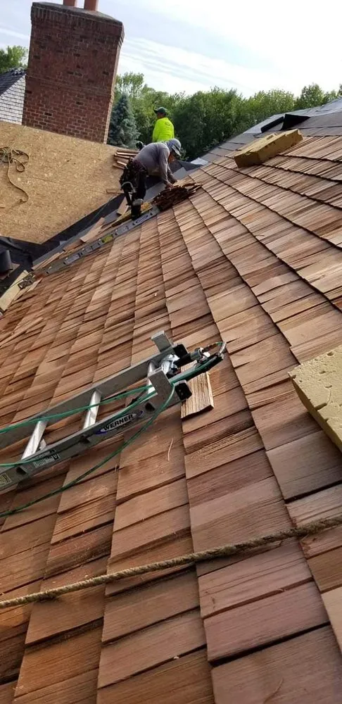 Slide of Ortiz Family Roofing & Landscaping