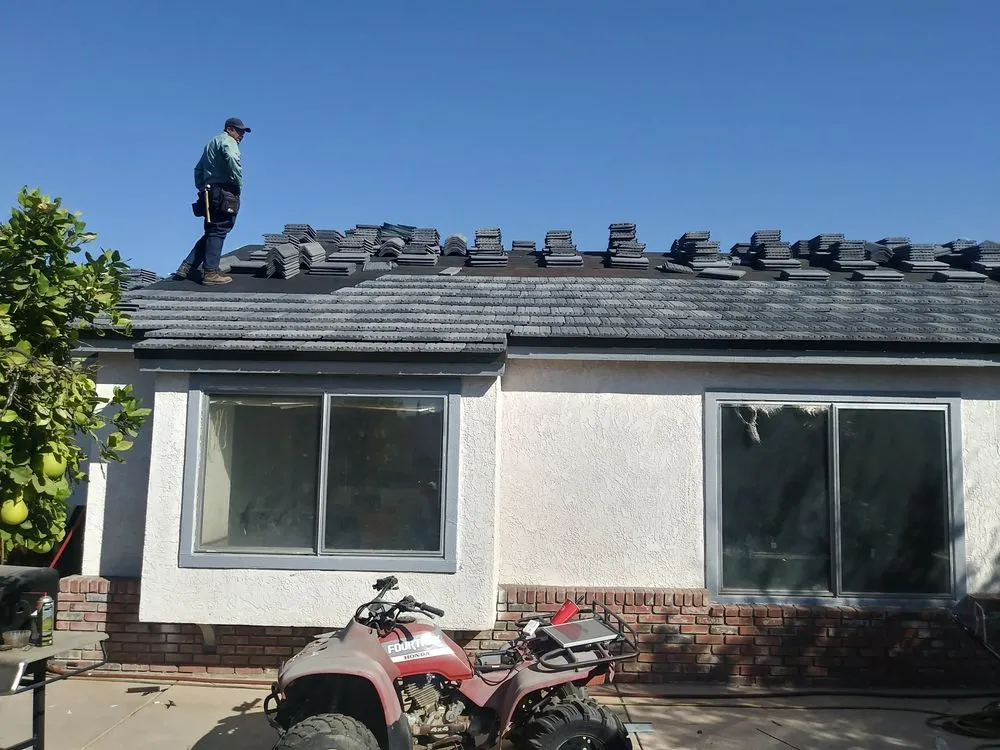 Slide of Ortiz Roofing and Construction Company