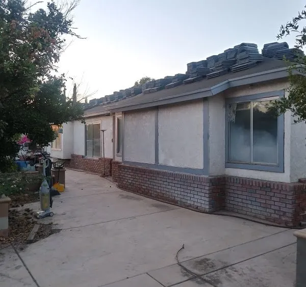 Slide of Ortiz Roofing and Construction Company