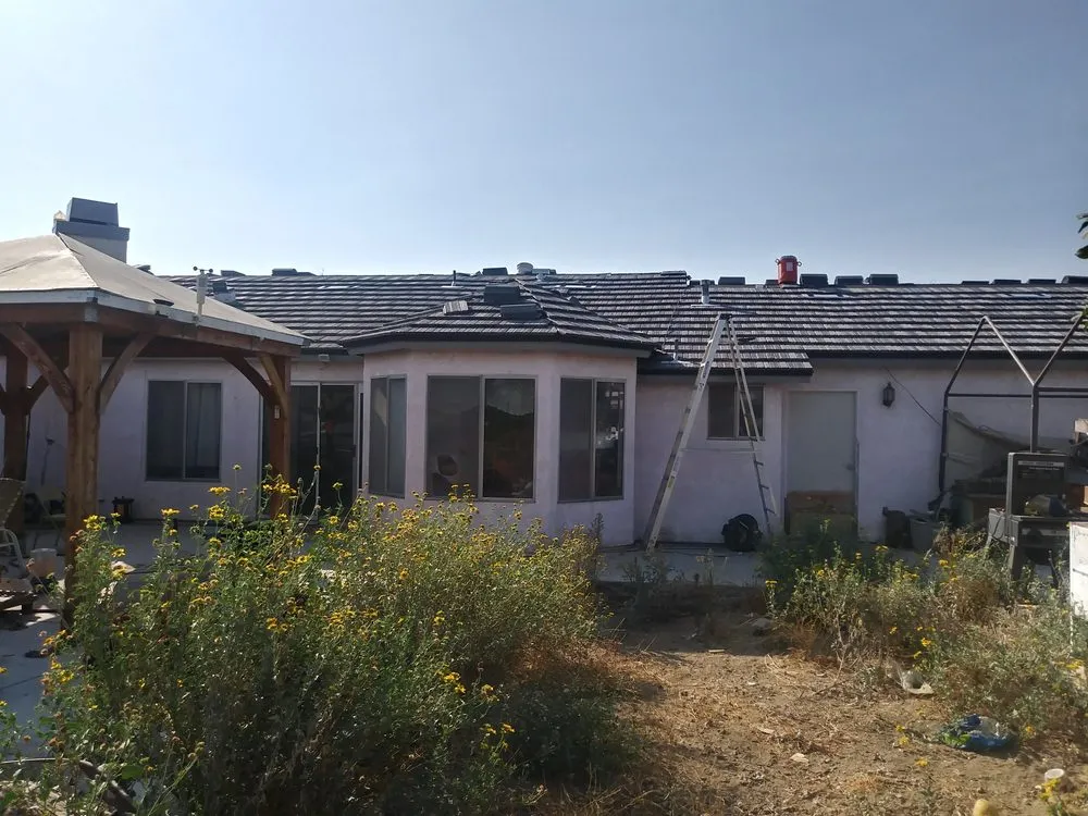 Slide of Ortiz Roofing and Construction Company