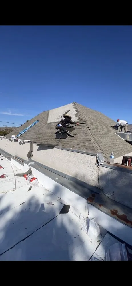 Slide of Ortiz Roofing