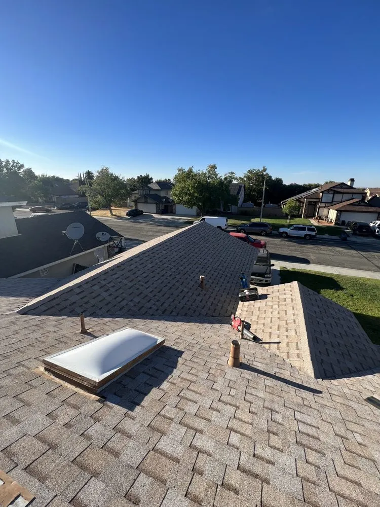 Slide of Ortiz Roofing