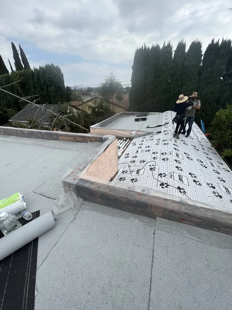 Slide of Ortiz Roofing