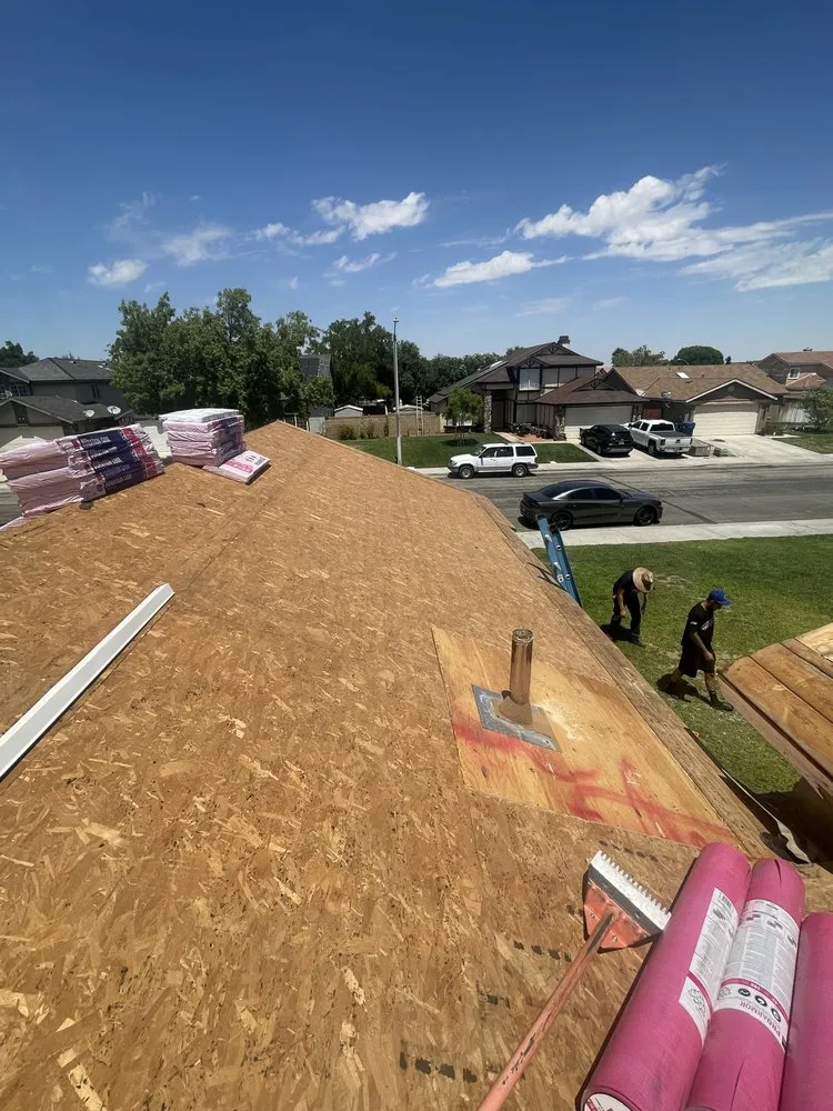 Slide of Ortiz Roofing