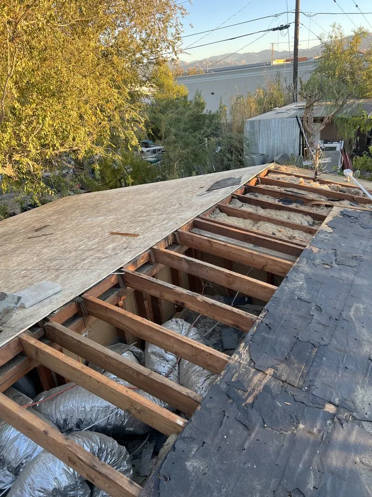 Slide of Ortiz Roofing