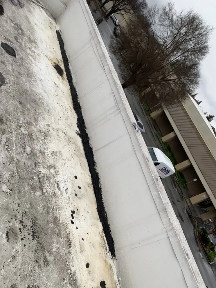 Slide of Ortiz Roofing