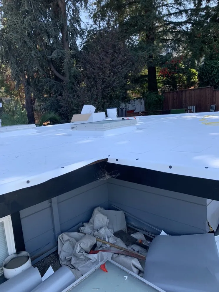 Slide of Ortiz Roofing