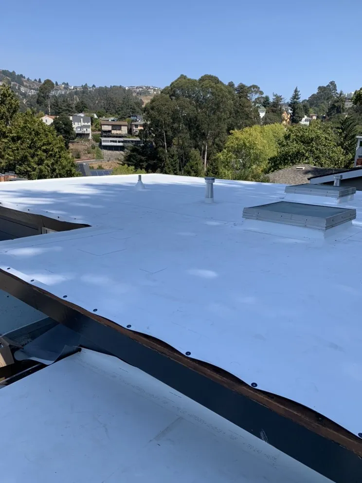 Slide of Ortiz Roofing