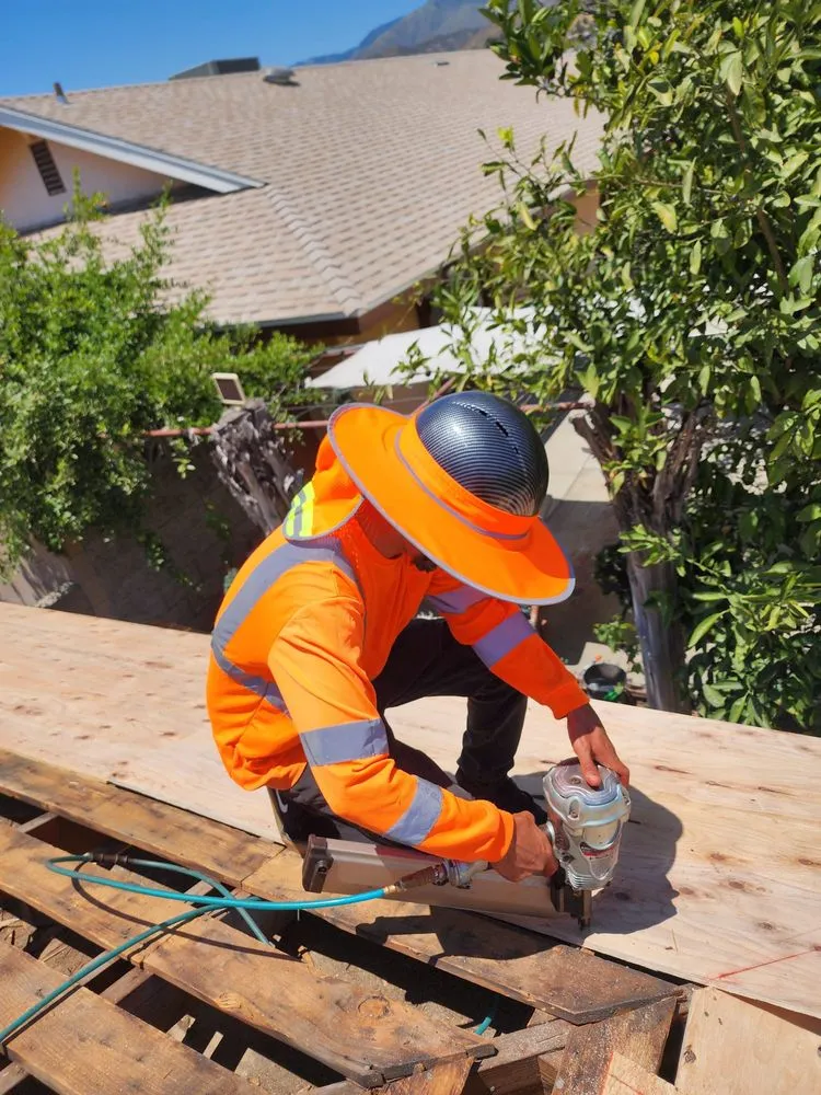 Professional metal roofing installation experts serving Devore Heights, CA - Oscar & Rosa