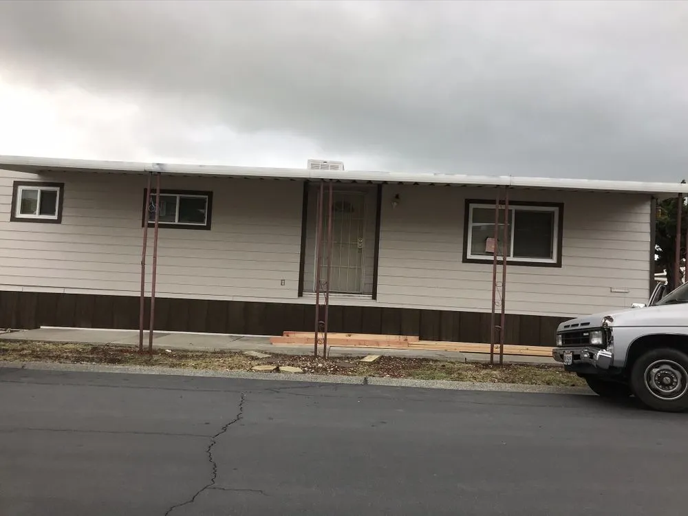 Slide of Oscar Construction DBA Roofing