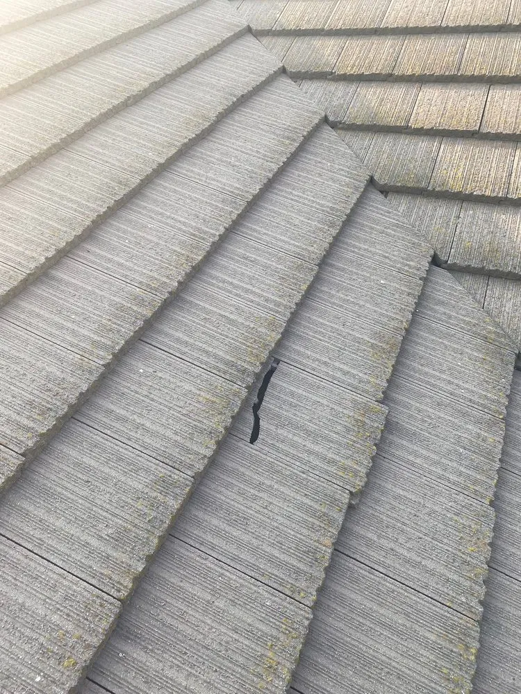 Slide of oscar Roofing