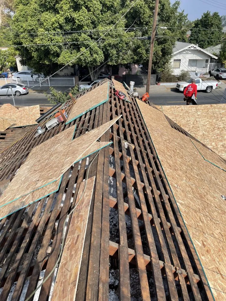 Slide of Oscar Roofing  services